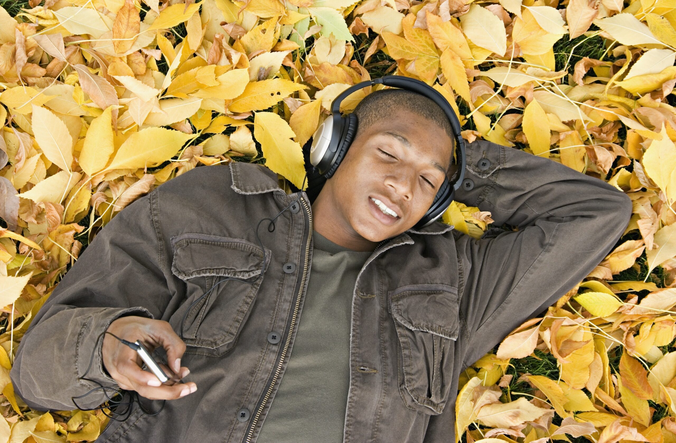 You are currently viewing LISTEN: Cozy up this autumn with Queerty’s 2023 Fall Playlist
