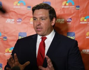Read more about the article Ron “Don’t Say Gay” DeSantis gets his a** handed to him in court (again) while running scared from a teenager