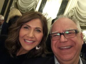 Read more about the article Once upon a time, Tim Walz & Kristi Noem were friends… then she falsely accused him of “mutilating children”