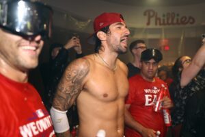 Read more about the article Phillies heartthrob Nick Castellanos, beer-soaked & shirtless, jams out to iconic gay anthem after division clinching win